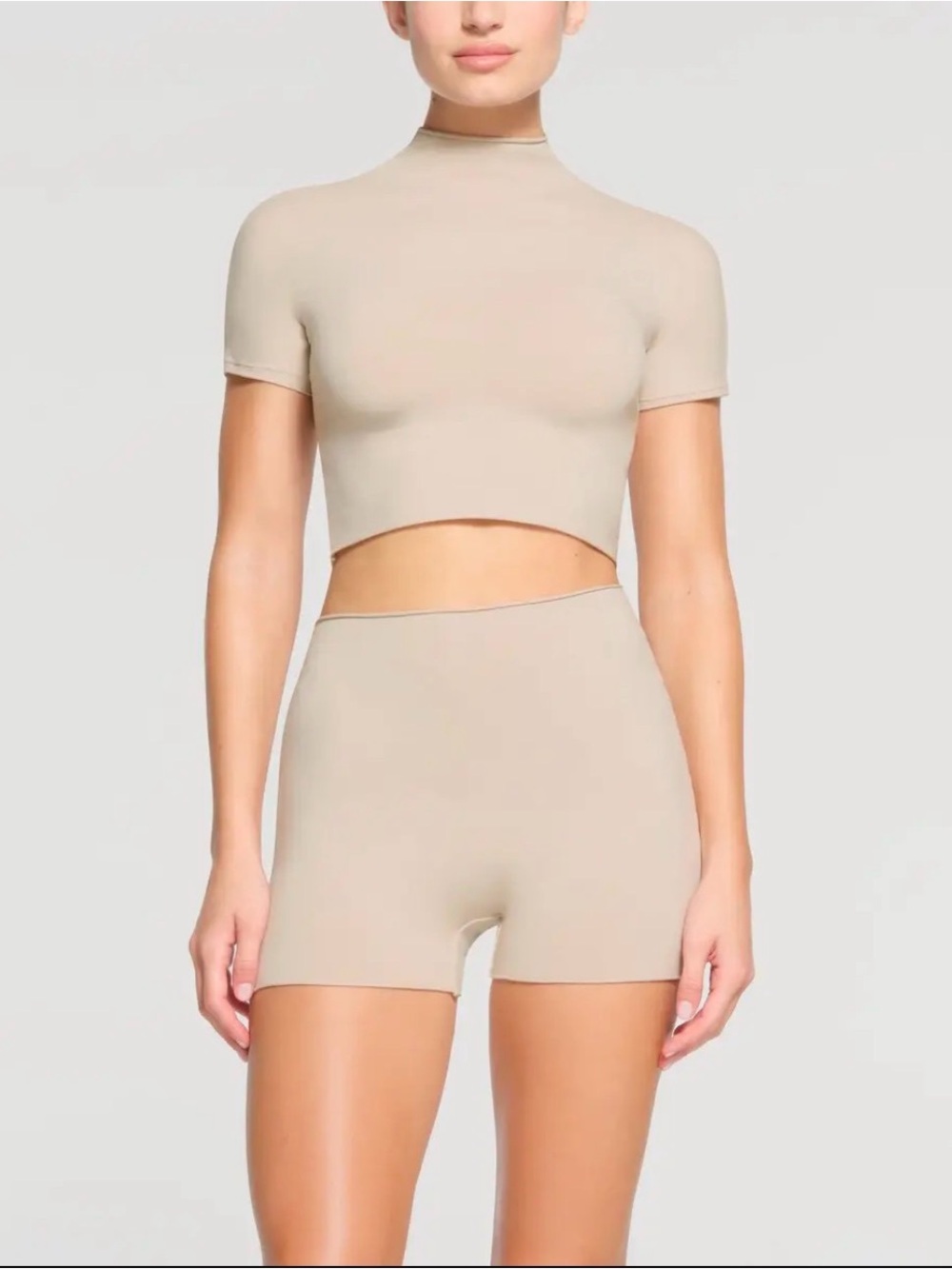 SKIMS raw edge mock neck cropped tshirt in Stone